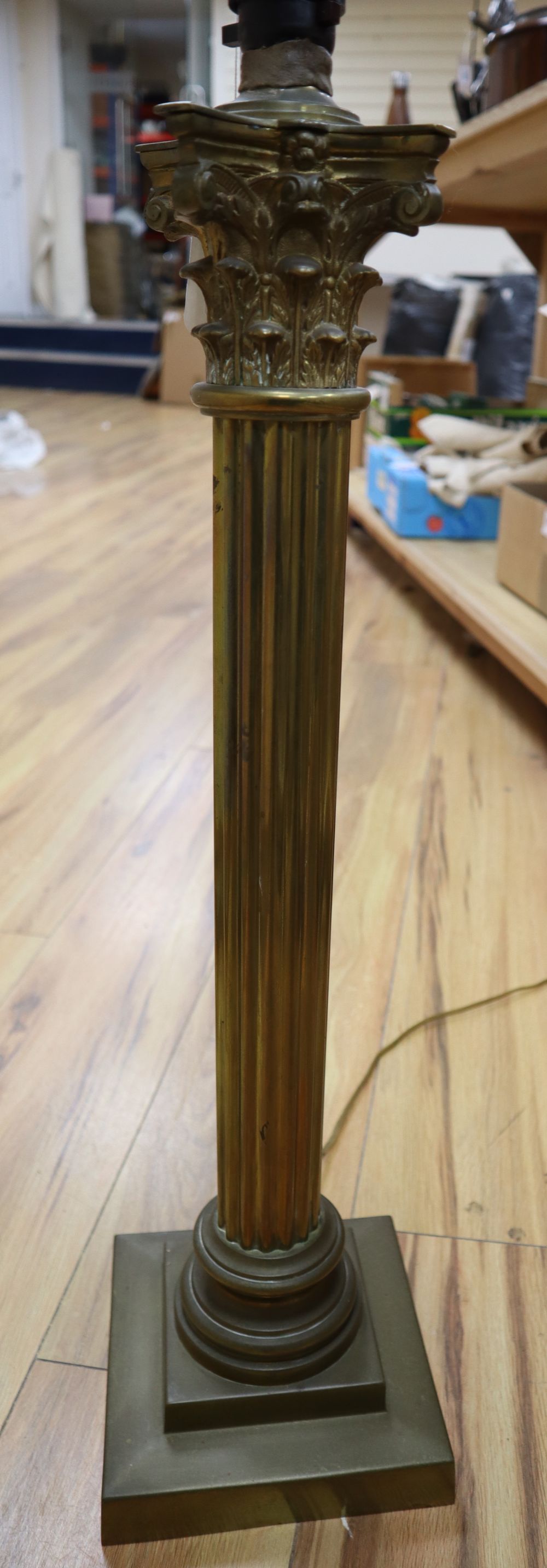 An early 20th century brass corinthian column table lamp, height 59cm excl. light fittings